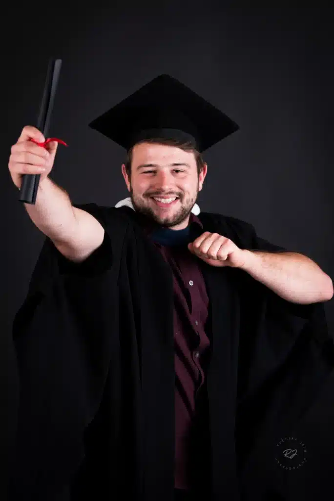 A dedicated photographer ensuring every detail is captured in graduation ceremony photography